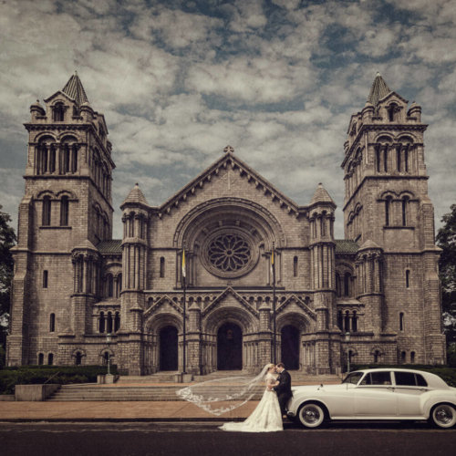 Wedding couple outside a church in St. Louis